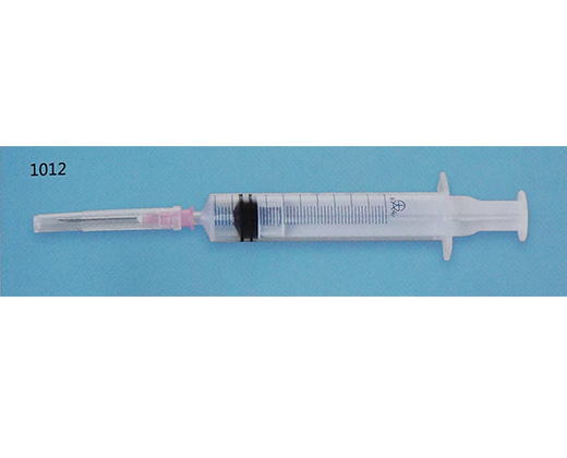 Disposable auto-disable syringe