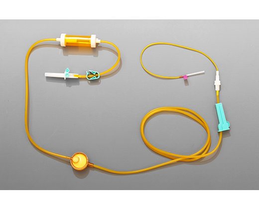 Disposable sterile light shielded infusion set